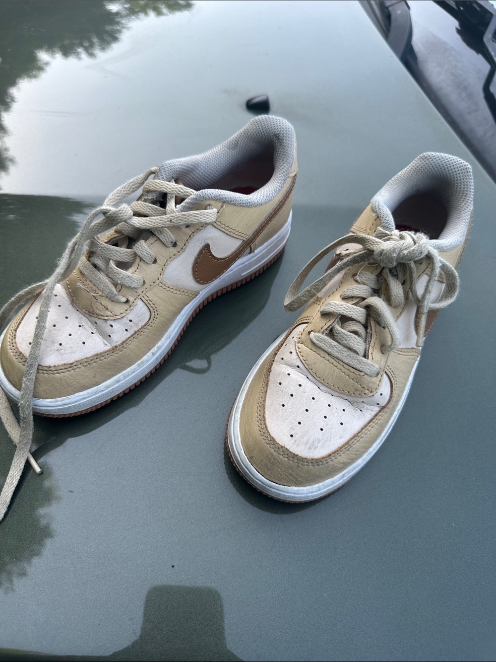 Nike Kids Low-Top Sneakers in Beige and Tan with Brown Swoosh